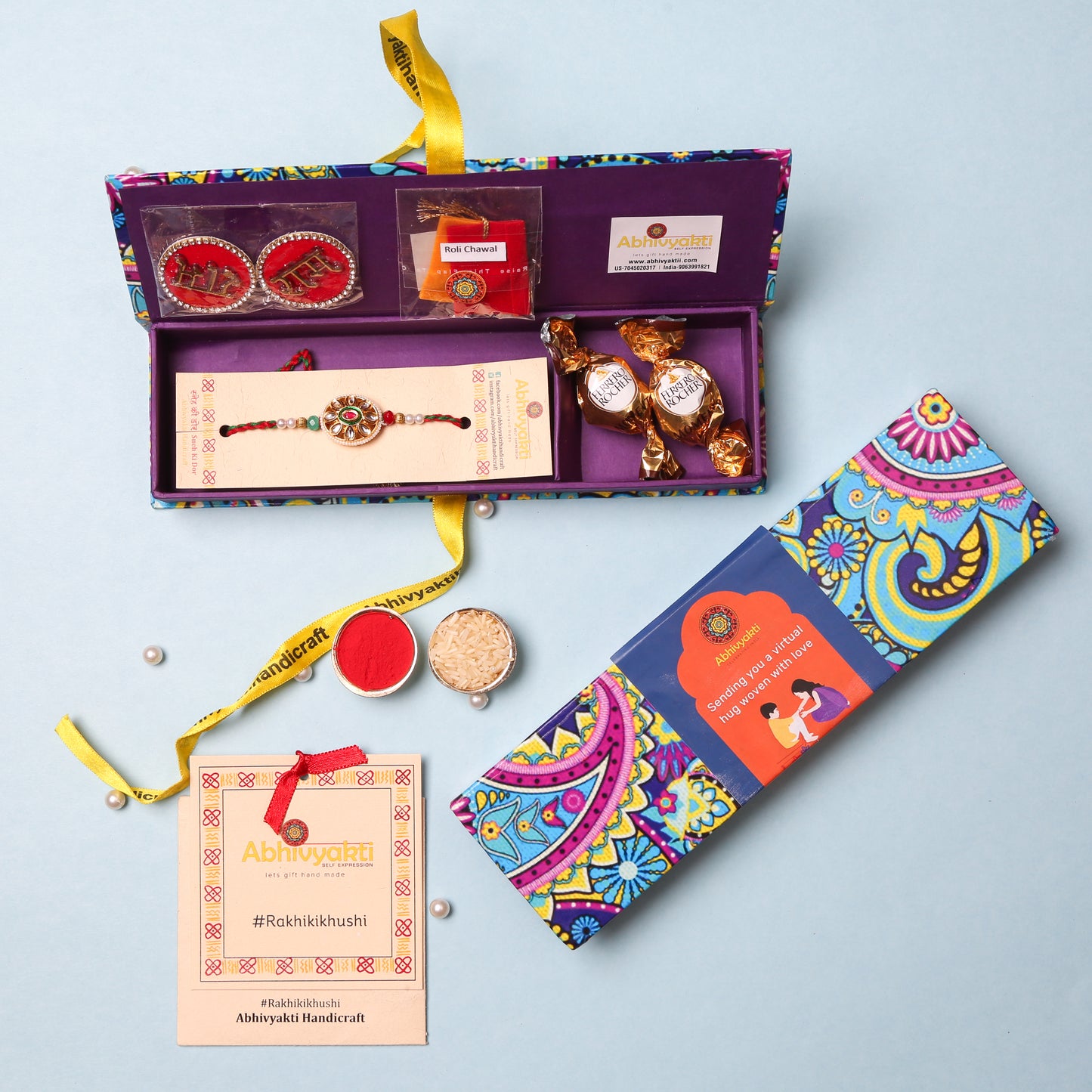 Multicolored stone rakhi with red threads, packed in a beautiful hamper premium quality box