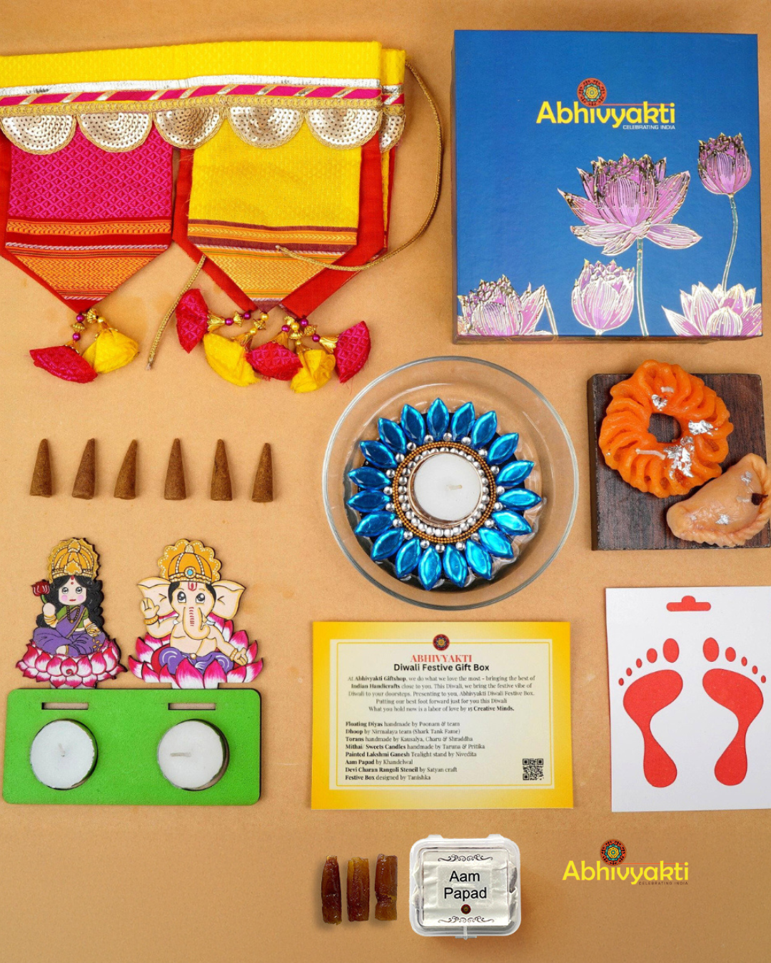 A festive Diwali hamper filled with an assortment of decorative items and treats. The hamper includes colorful floating diya, a box of mithai sweet candle, fragrant incense sticks, a small decorative toran, and festive Ganesh Lakshmi tealight alongwith tangy juicy mango roll up . The items are beautifully arranged in a festive box with vibrant, rich colors and intricate detailing, evoking the spirit of Diwali celebrations. The hamper is a perfect gift for the festive vibe
