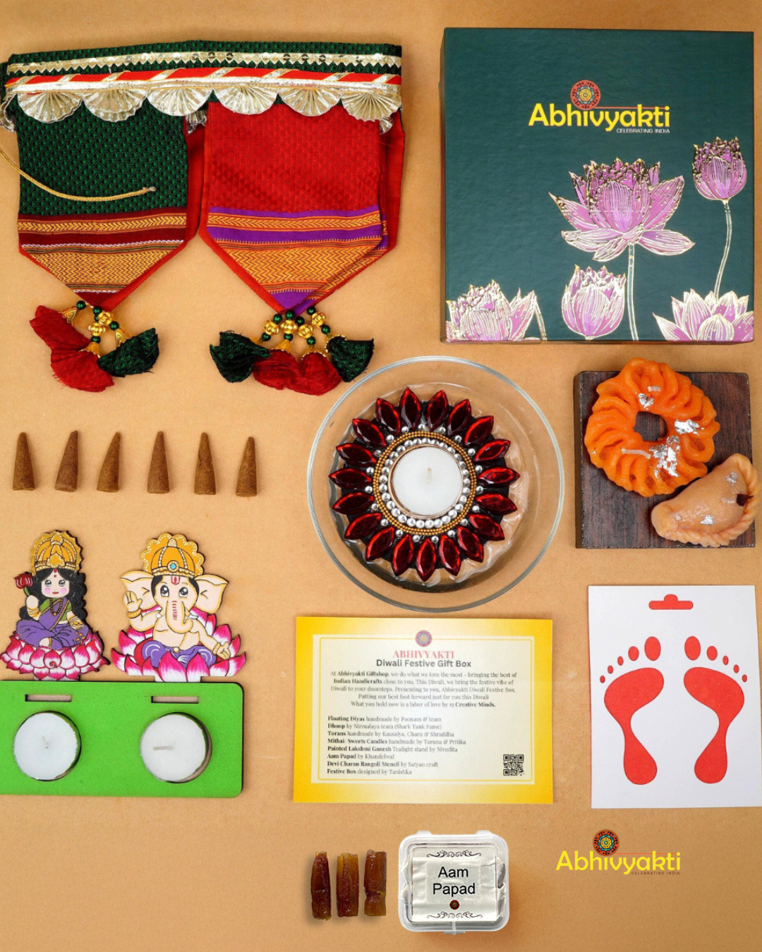 A festive Diwali hamper filled with an assortment of decorative items and treats. The hamper includes colorful floating diya, a box of mithai sweet candle, fragrant incense sticks, a small decorative toran, and festive Ganesh Lakshmi tealight alongwith tangy juicy mango roll up . The items are beautifully arranged in a festive box with vibrant, rich colors and intricate detailing, evoking the spirit of Diwali celebrations. The hamper is a perfect gift for the festive vibe
