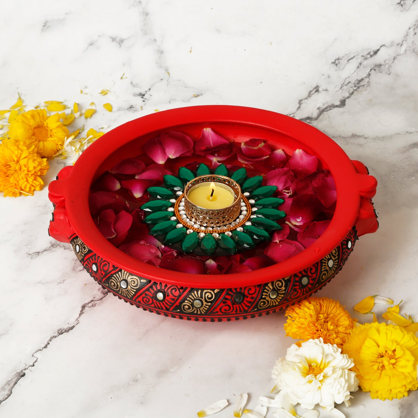 A collection of colorful floating tealight diyas, intricately designed with floral patterns and bright hues. The diyas are crafted from traditional Indian materials, adding a festive and cultural touch to any setting. Perfect for illuminating water bowls or enhancing Diwali decor with a soft, warm glow
