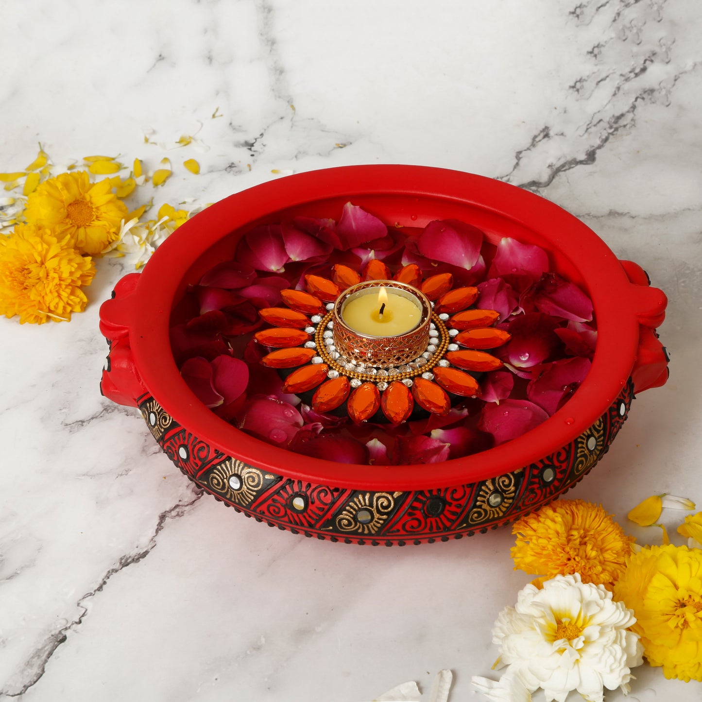 A collection of colorful floating tealight diyas, intricately designed with floral patterns and bright hues. The diyas are crafted from traditional Indian materials, adding a festive and cultural touch to any setting. Perfect for illuminating water bowls or enhancing Diwali decor with a soft, warm glow