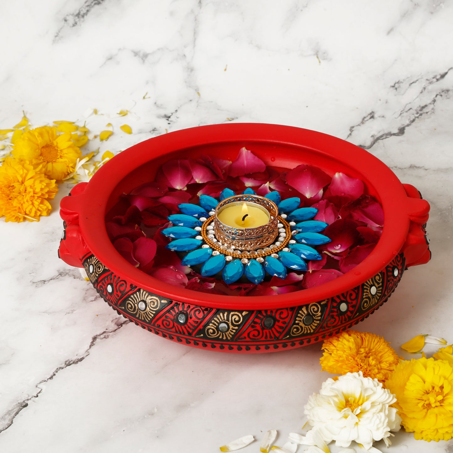 A collection of colorful floating tealight diyas, intricately designed with floral patterns and bright hues. The diyas are crafted from traditional Indian materials, adding a festive and cultural touch to any setting. Perfect for illuminating water bowls or enhancing Diwali decor with a soft, warm glow