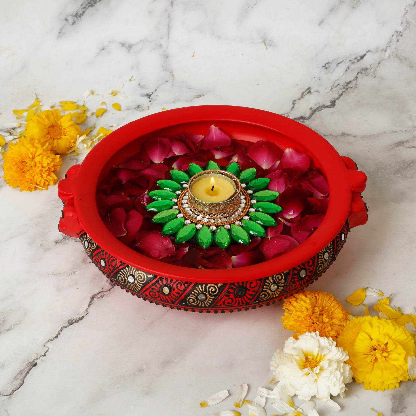 A collection of colorful floating tealight diyas, intricately designed with floral patterns and bright hues. The diyas are crafted from traditional Indian materials, adding a festive and cultural touch to any setting. Perfect for illuminating water bowls or enhancing Diwali decor with a soft, warm glow