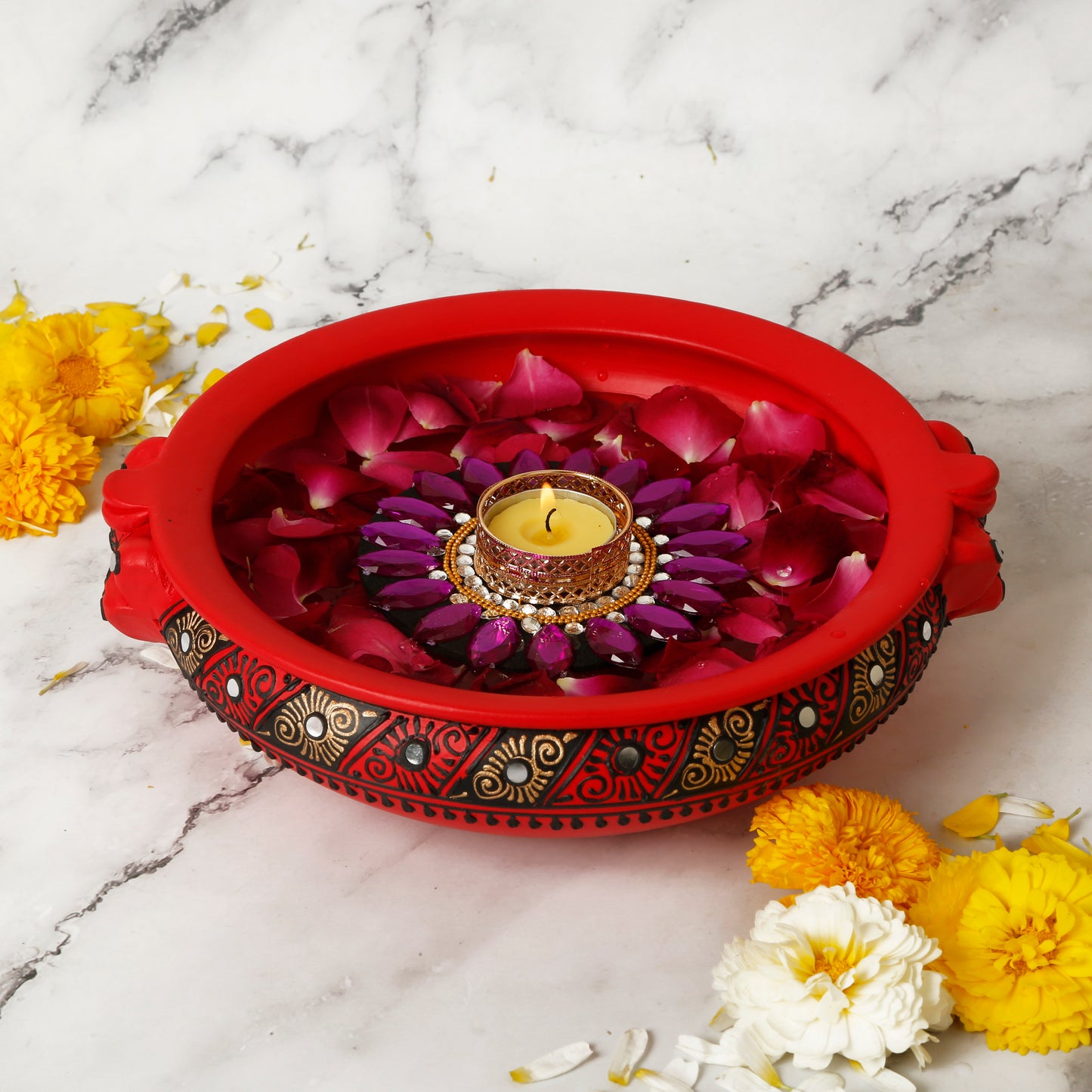 A collection of colorful floating tealight diyas, intricately designed with floral patterns and bright hues. The diyas are crafted from traditional Indian materials, adding a festive and cultural touch to any setting. Perfect for illuminating water bowls or enhancing Diwali decor with a soft, warm glow