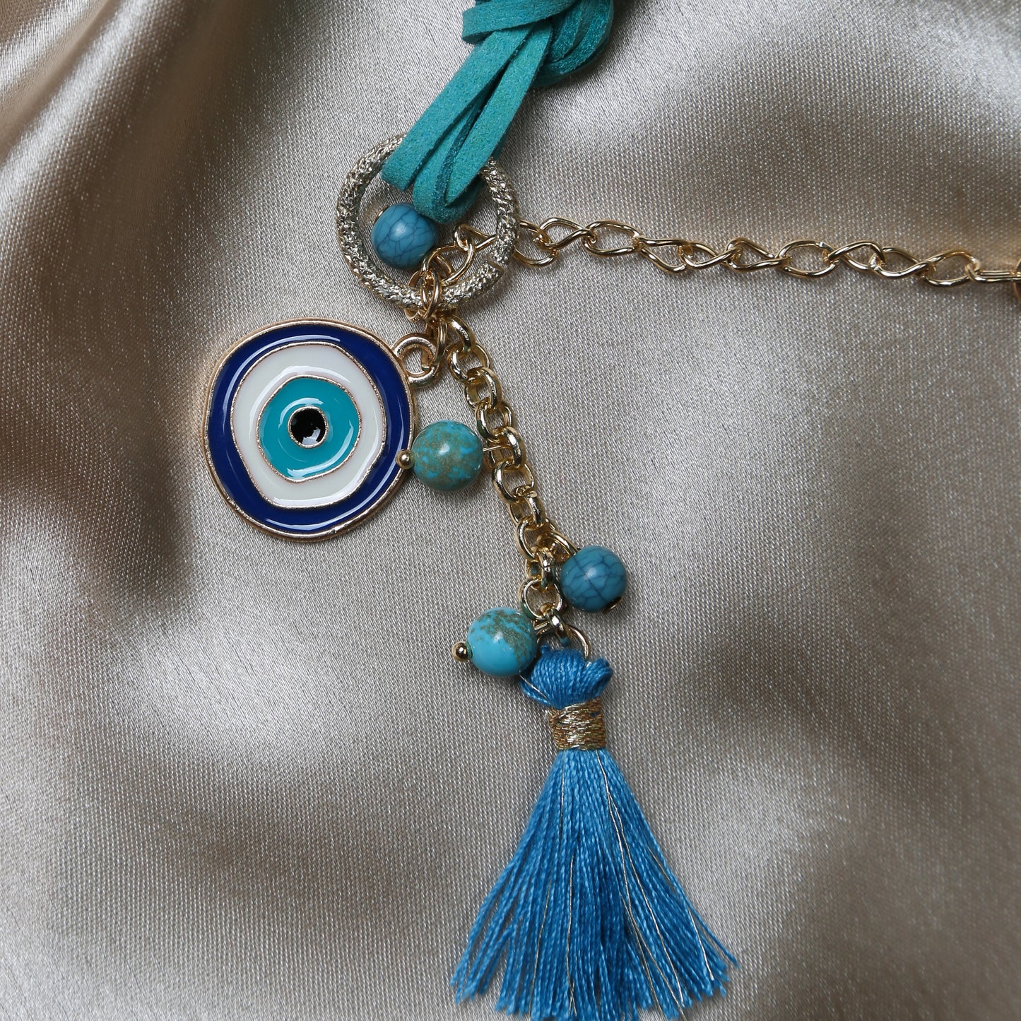 Crafted with precision, the bracelet comes with an adjustable strap, making it a perfect fit for every wrist. The evil eye charm, beautifully set in vibrant blues and whites, adds a pop of color and mystical allure to any outfit. Ideal for daily wear, it’s not just an accessory, but a reminder of positivity and well-being.