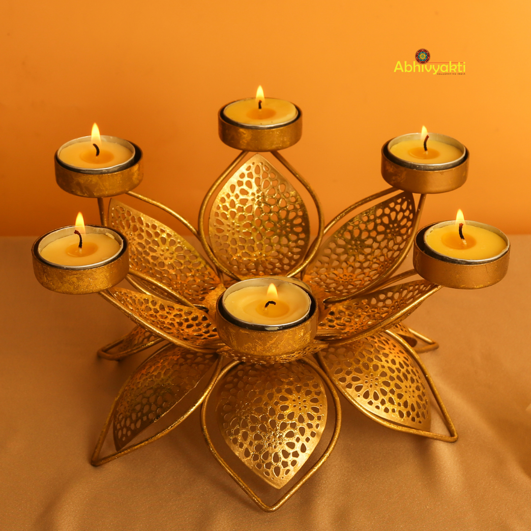 Decorative Padam Tealight Holder Table Top (Large) with floral design on a reflective yellow surface