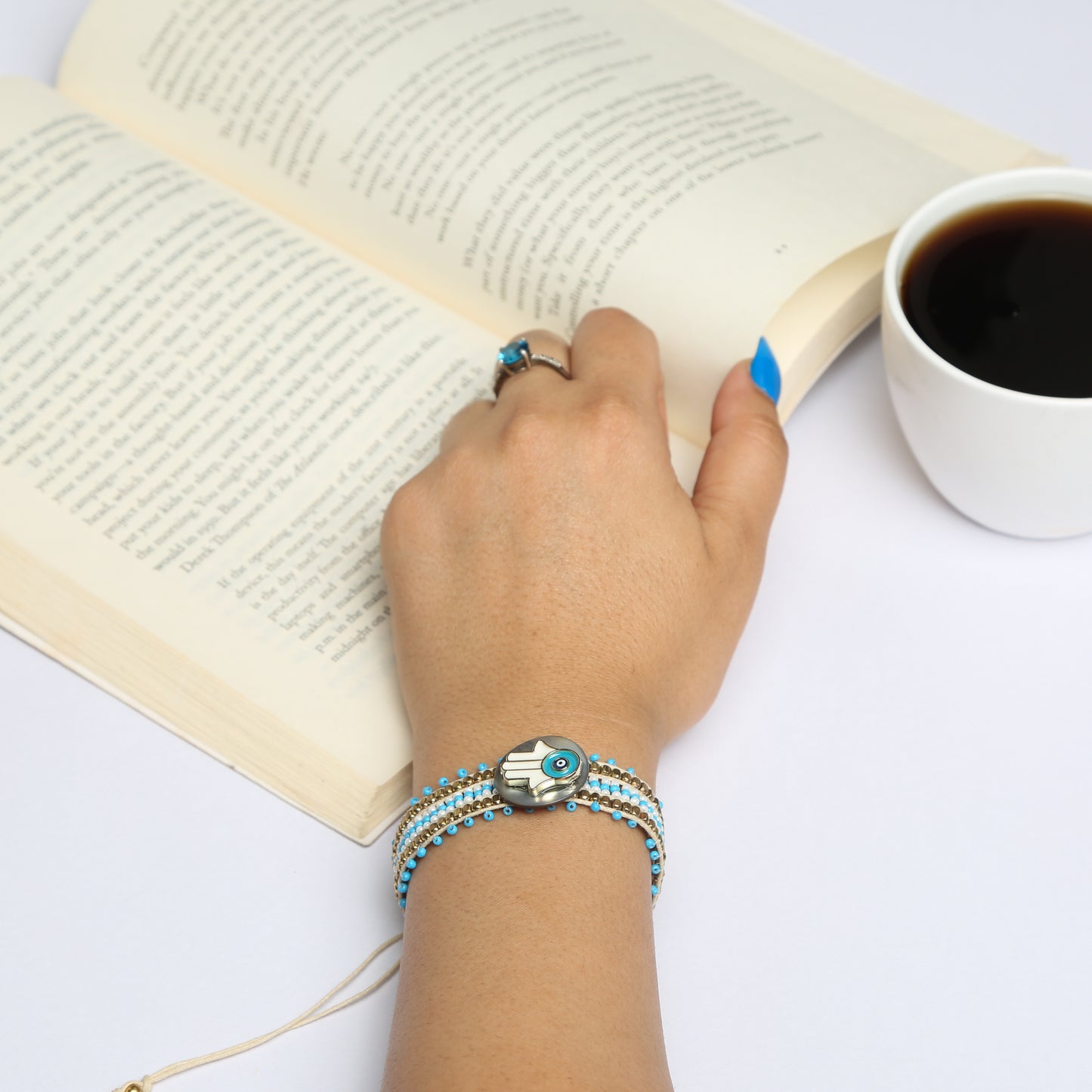 Made with an adjustable strap, this unisex bracelet ensures a perfect fit for any wrist size, making it both comfortable and stylish. The charm’s delicate detailing and its association with ancient traditions bring a sense of cultural elegance and spiritual protection to your wardrobe.