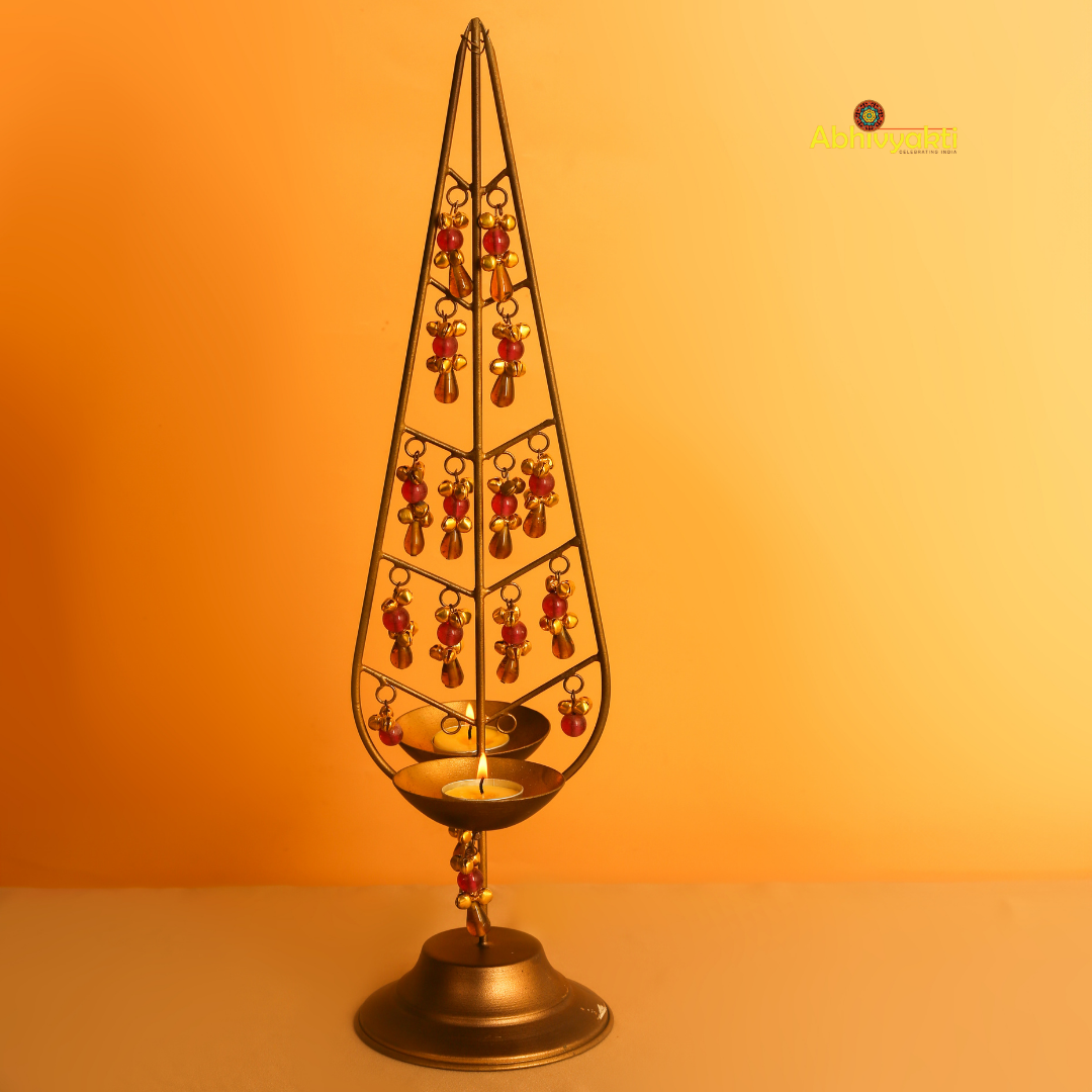 Decorative Kalp Taru tealight holder gold lamp with intricate design