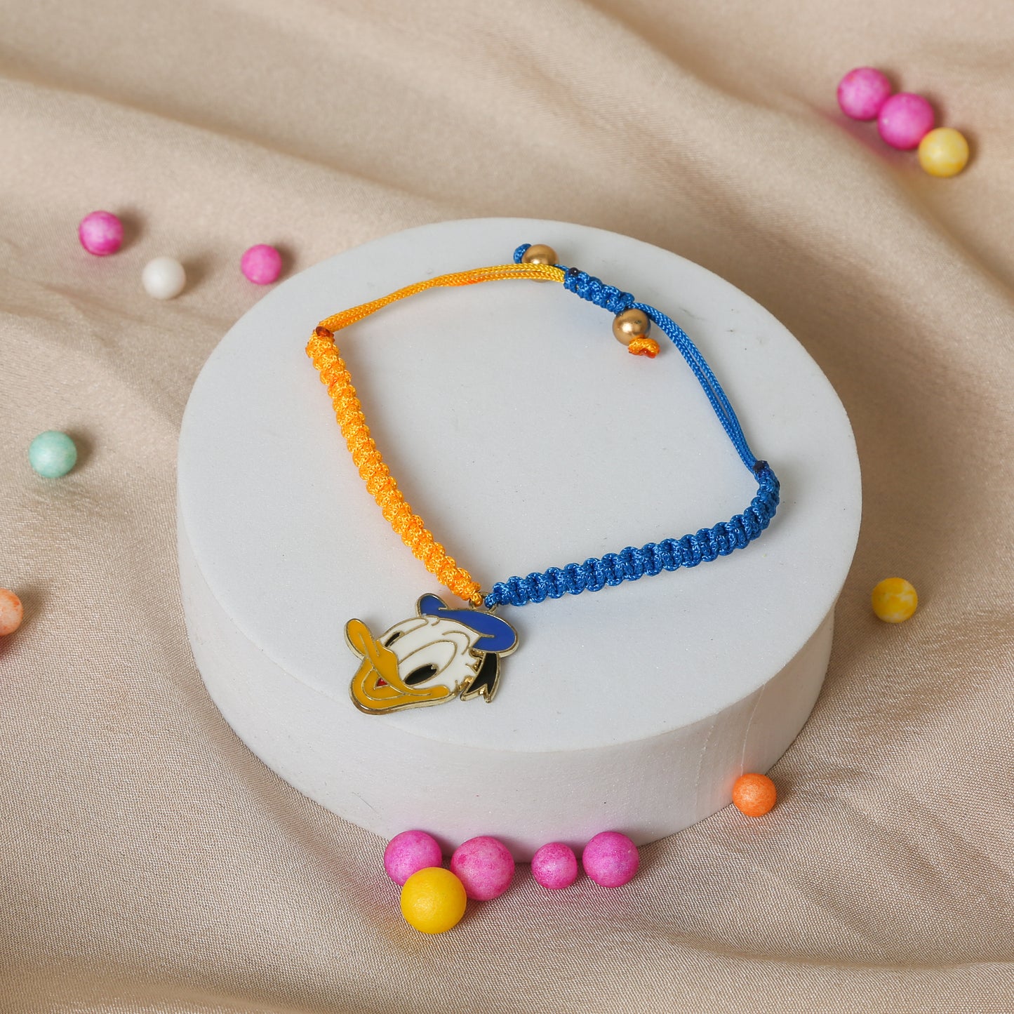 Make your Baby Brother/ sister feel special by sending the cutest Donald Duck Slider Adjustable Kids Bracelet Baby Rakhis handmade in India