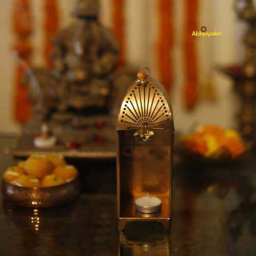 Decorative Traditional Mandir Tealight Holder Table Top with floral elements and a blurred and blured background