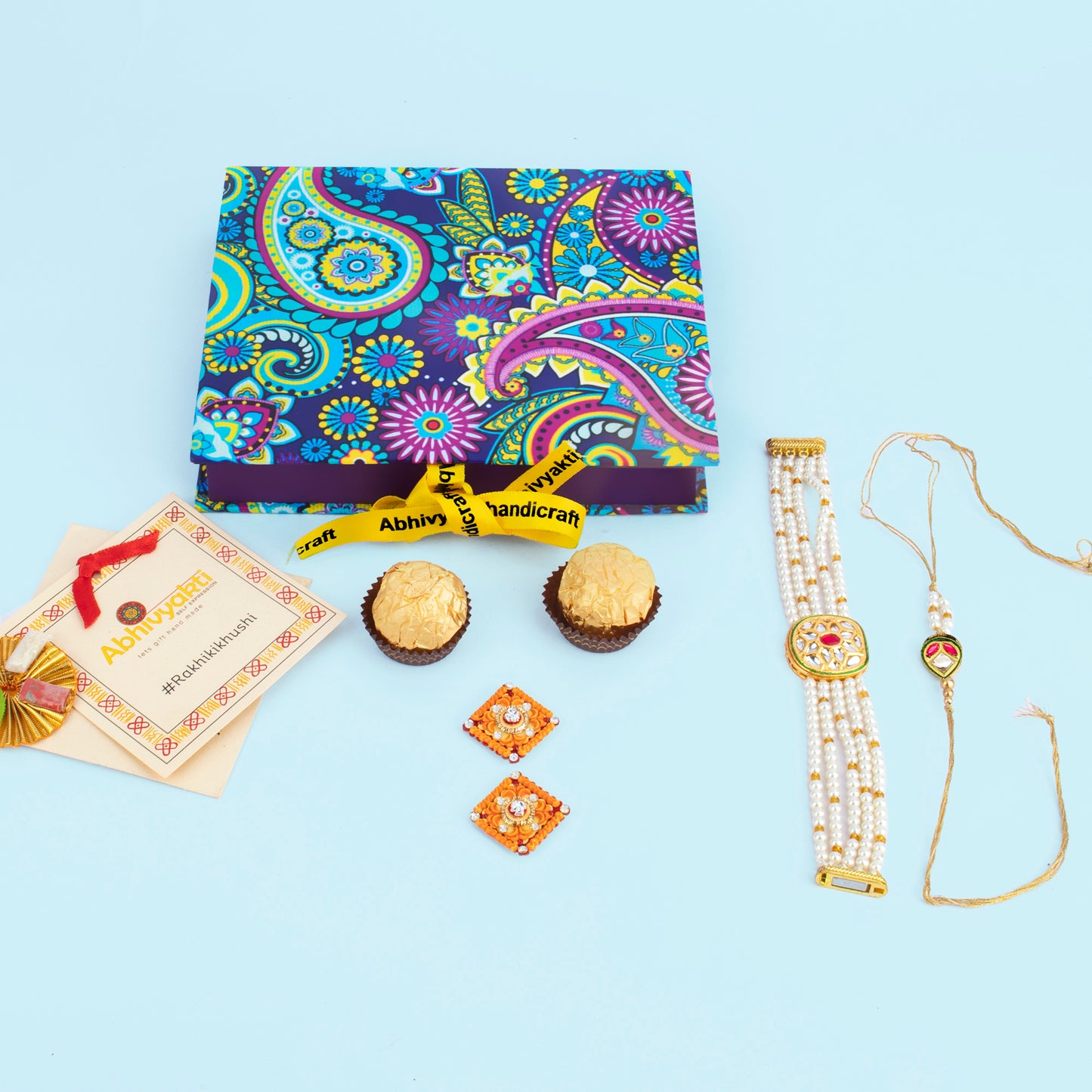 Exquisite bracelet embellished with gold and pearl beads, highlighting a gorgeous rakhi lumba with stones and beads.