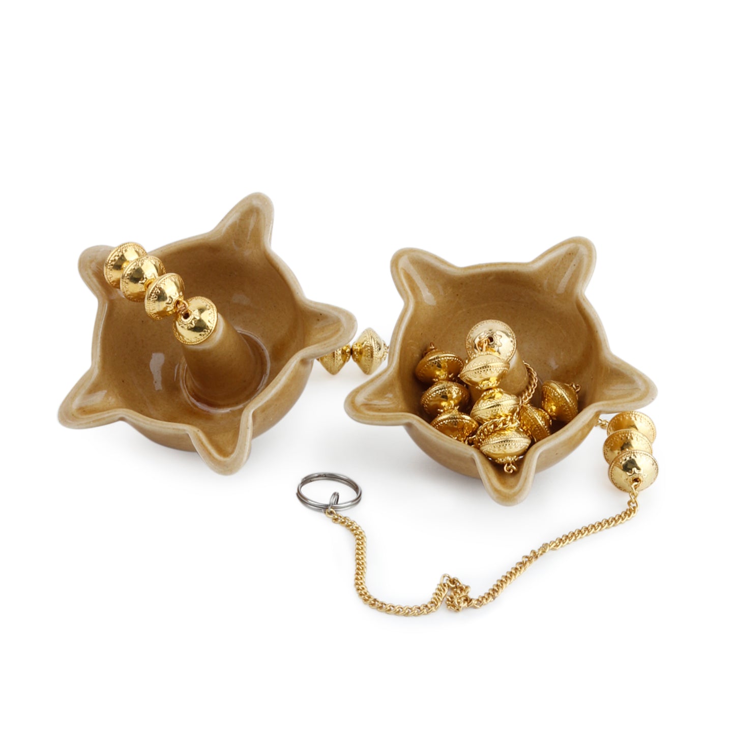 "Elegant wall-mounted Diwali diyas with intricate metal holders, designed to hang on the wall for a unique and stylish look. The diyas cast a soft, flickering light, creating a serene and festive ambiance for Diwali celebrations."