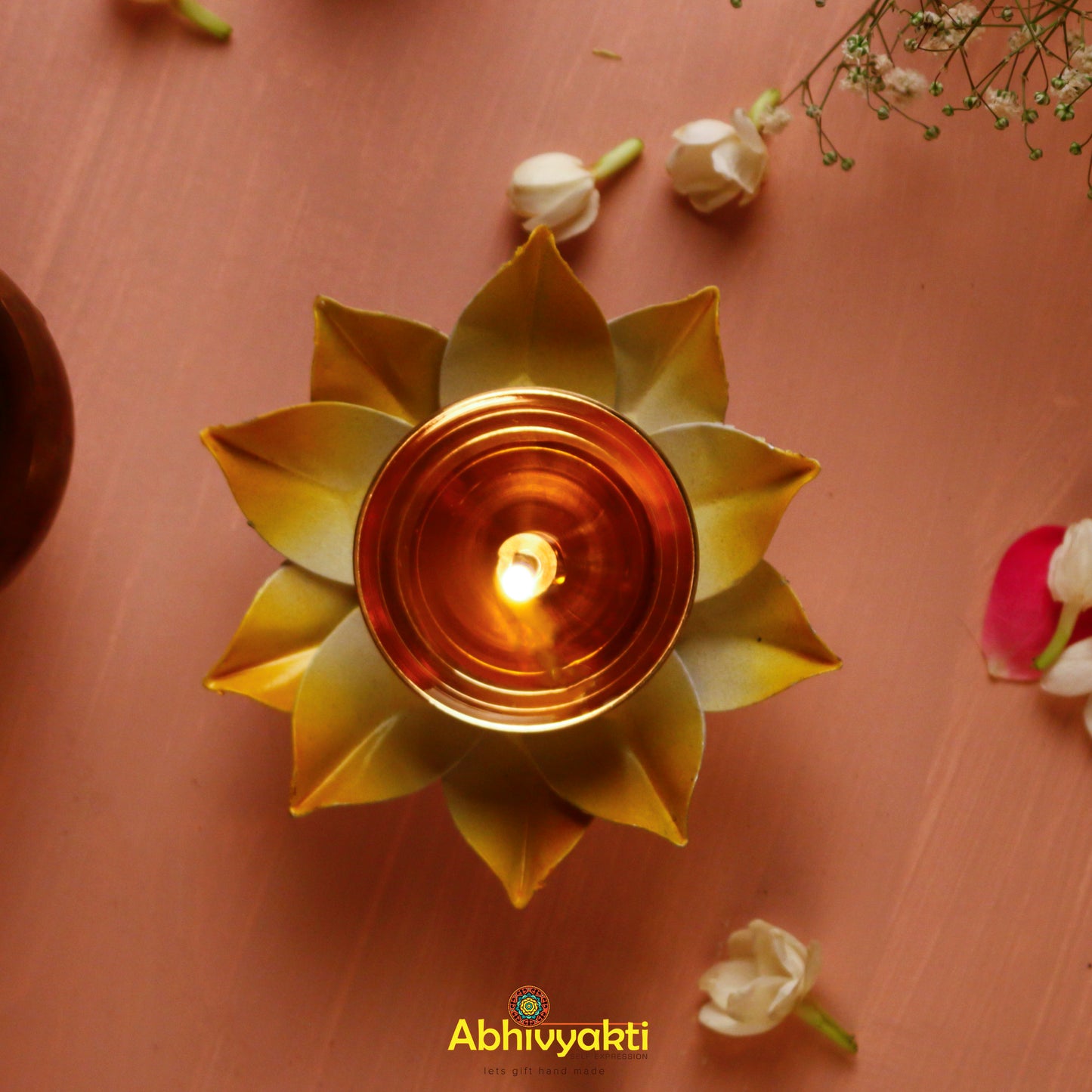 A set of traditional Diwali diyas, beautifully crafted and painted in festive colors. These tabletop oil lamps are adding a warm and inviting glow to any celebration or festive decor A set of traditional Diwali diyas, beautifully crafted and painted in festive colors. These tabletop oil lamps are arranged in decorative patterns, adding a warm and inviting glow to any celebration or festive decor
