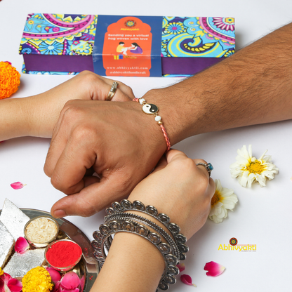 Celebrating rakshabandhan with sister tying beautiful YIN-YANG rakhi to her brother
