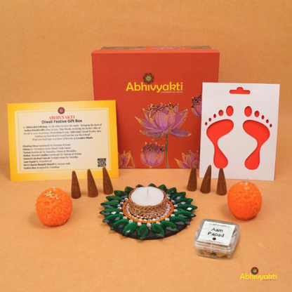 A festive Diwali hamper filled with an assortment of decorative items and treats. The hamper includes colorful floating diya, a box of mithai sweet candle, fragrant incense sticks, a small decorative toran, and festive Ganesh Lakshmi tealight alongwith tangy juicy mango roll up . The items are beautifully arranged in a festive box with vibrant, rich colors and intricate detailing, evoking the spirit of Diwali celebrations. The hamper is a perfect gift for the festive vibe