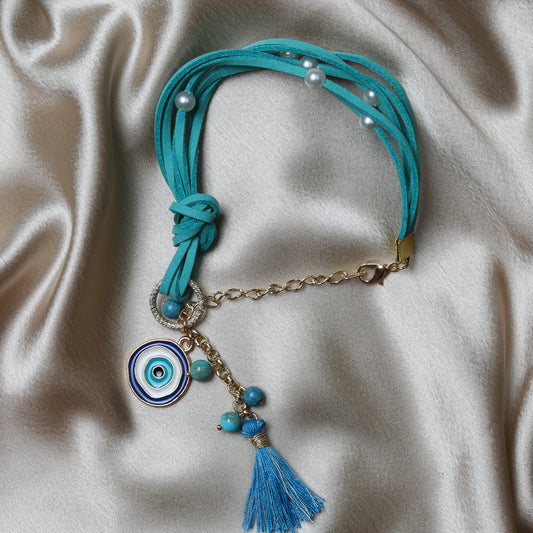 Crafted with precision, the bracelet comes with an adjustable strap, making it a perfect fit for every wrist. The evil eye charm, beautifully set in vibrant blues and whites, adds a pop of color and mystical allure to any outfit. Ideal for daily wear, it’s not just an accessory, but a reminder of positivity and well-being.