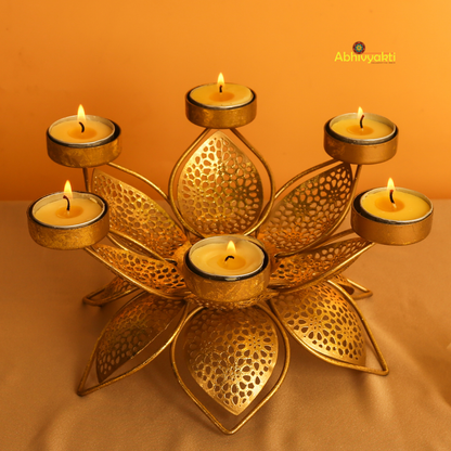 Decorative Padam Tealight Holder Table Top (Large) with floral design on a reflective yellow surface
