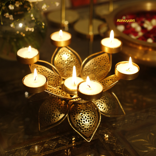 Decorative Padam Tealight Holder Table Top (Large) with floral design on a reflective surface