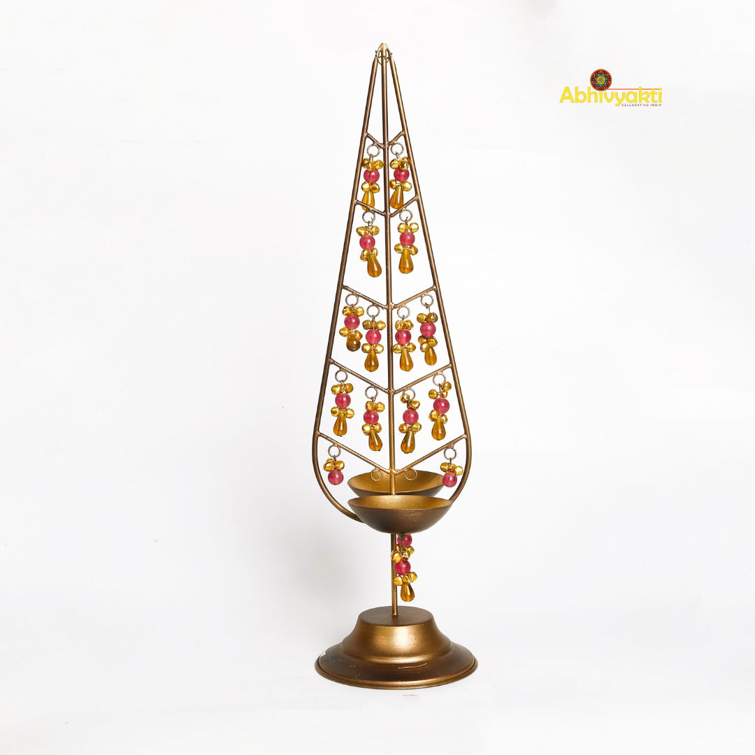 Decorative Kalp Taru tealight holder gold lamp with intricate design 