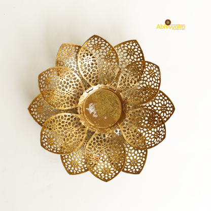 Gold-colored metal lotus flower-shaped t-light holder Padam on a white bg