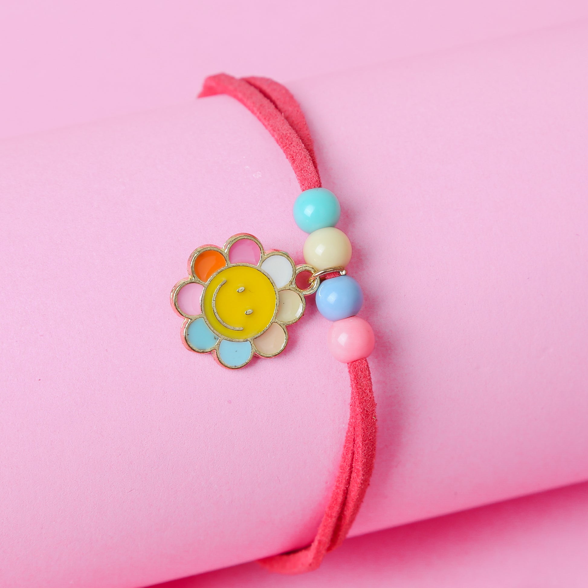 Introducing our adorable Rainbow Sunshine Kids Bracelet! Discover our charming Peppa Pig Kids Bracelet, designed for little fans of the flowers. It is handmade with soft fabric and a secure clasp. Its vibrant colors and durable design make it a must-have accessory for any nature lover. Suitable for all seasons, this bracelet is a delightful gift for your little sunshines!