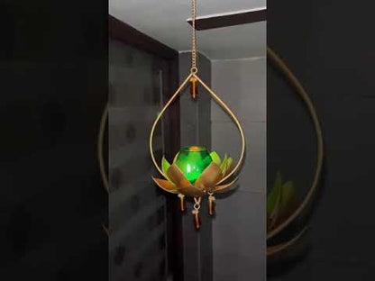 "Elegant wall-mounted Diwali diyas with intricate metal holders, designed to hang on the wall for a unique and stylish look. The diyas cast a soft, flickering light, creating a serene and festive ambiance for Diwali celebrations."