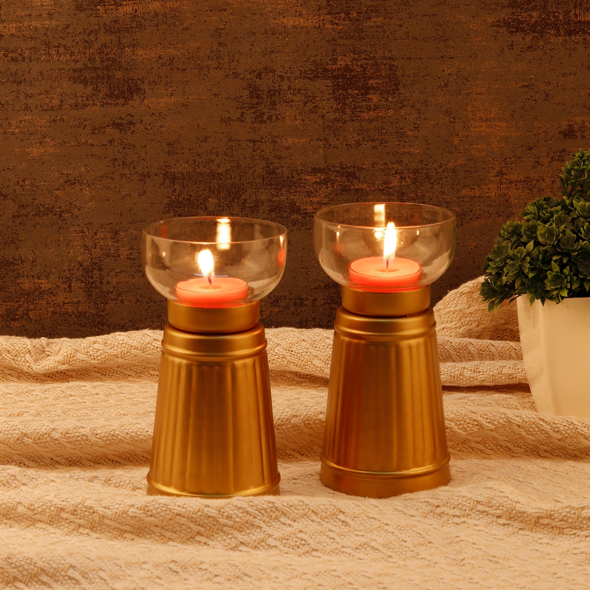 "A set of traditional Diwali diyas, beautifully crafted and painted in festive colors.
These tabletop oil lamps are arranged in decorative patterns, adding a warm and inviting glow to any celebration or festive decor.”