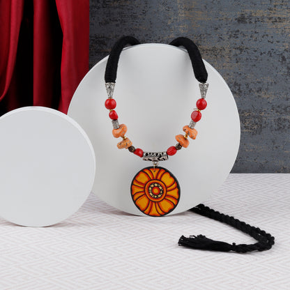 This beautiful Adjustable Necklace with Wooden Pendant is hand painted and an exquisite Indian Jewellery inspired by Kerala Mural Art designed on crafted wood. It is surely an elegant wear for any occasion. A perfect head turner and a conversation starter..