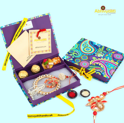 Elegant red and white rakhi featuring pearls and beads, a decorative lumba rakhi with stones & beads.