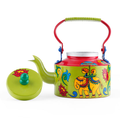 "A vibrant, handpainted kettle with quirky designs and bold colors, featuring intricate Indian folk art. The kettle is adorned with playful motifs and patterns, perfect as a decorative statement piece for a creative and culturally inspired home."