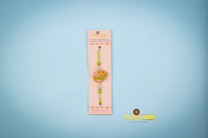 Green thread, zardozi thread and crystal rakhi 