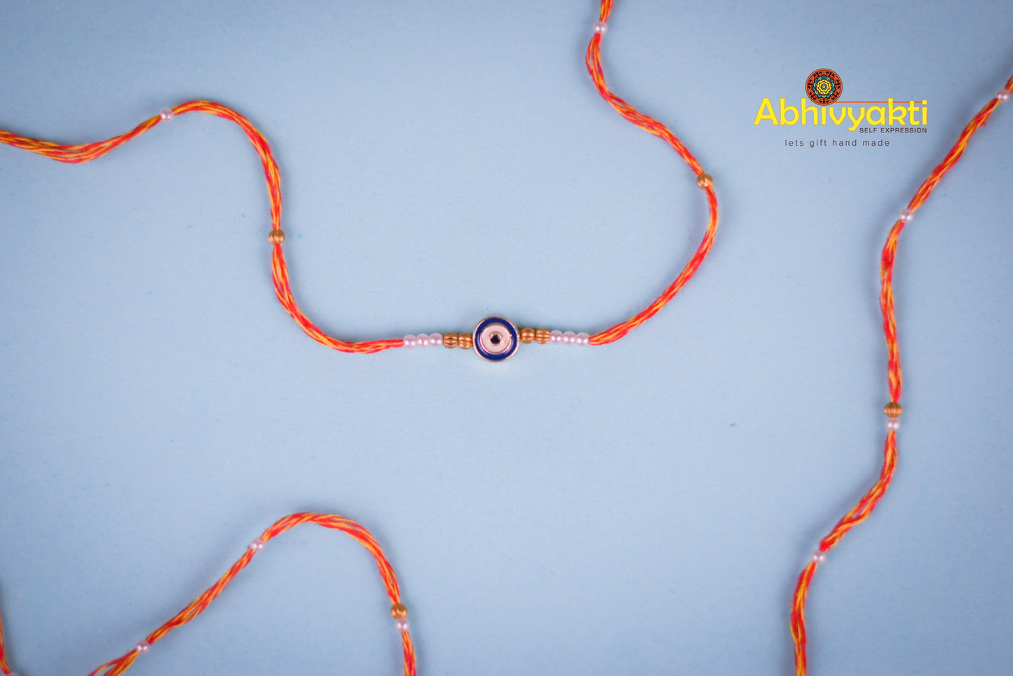 Evil Eye Stone Rakhi - Long Thread -Send to USA ( Free shipping )