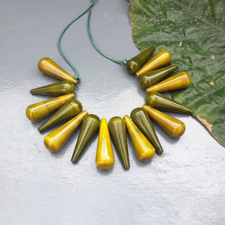 Beautifully Hand crafted seasons gift from the land of Channapatna. These Boho Wooden Adjustable Necklaces are going to be a great festive fashion concept for you !

They are made of sustainable wood with lacquered finish has a distinctive, nostalgic style. Each and every color is completely safe and are made from non-toxic vegetable colors.
