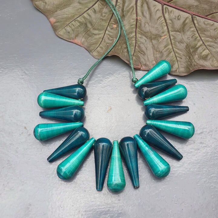 Beautifully Hand crafted seasons gift from the land of Channapatna. These Boho Wooden Adjustable Necklaces are going to be a great festive fashion concept for you !

They are made of sustainable wood with lacquered finish has a distinctive, nostalgic style. Each and every color is completely safe and are made from non-toxic vegetable colors.