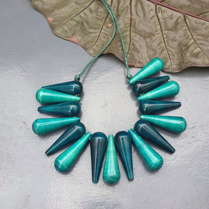 Beautifully Hand crafted seasons gift from the land of Channapatna. These Boho Wooden Adjustable Necklaces are going to be a great festive fashion concept for you !

They are made of sustainable wood with lacquered finish has a distinctive, nostalgic style. Each and every color is completely safe and are made from non-toxic vegetable colors.