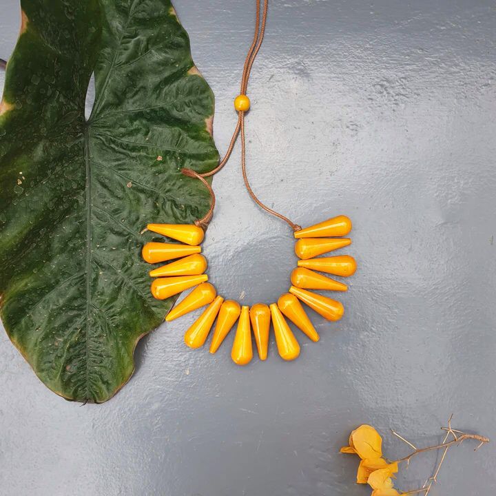 Beautifully Hand crafted seasons gift from the land of Channapatna. These Boho Wooden Adjustable Necklaces are going to be a great festive fashion concept for you !

They are made of sustainable wood with lacquered finish has a distinctive, nostalgic style. Each and every color is completely safe and are made from non-toxic vegetable colors.
