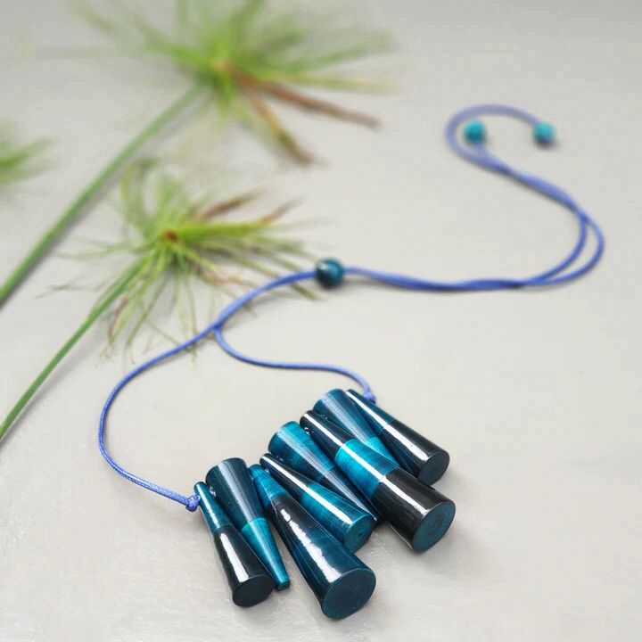Beautifully Hand crafted seasons gift from the land of Channapatna. These Boho Wooden Adjustable Necklaces are going to be a great festive fashion concept for you !

They are made of sustainable wood with lacquered finish has a distinctive, nostalgic style. Each and every color is completely safe and are made from non-toxic vegetable colors.
