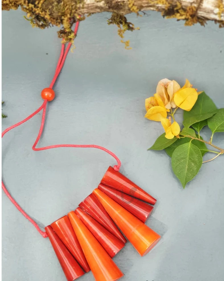 Beautifully Hand crafted seasons gift from the land of Channapatna. These Boho Wooden Adjustable Necklaces are going to be a great festive fashion concept for you !

They are made of sustainable wood with lacquered finish has a distinctive, nostalgic style. Each and every color is completely safe and are made from non-toxic vegetable colors.
