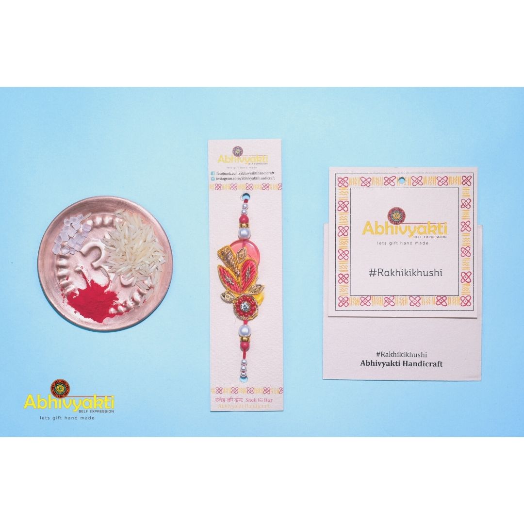 Green thread, zardozi thread and crystal rakhi 