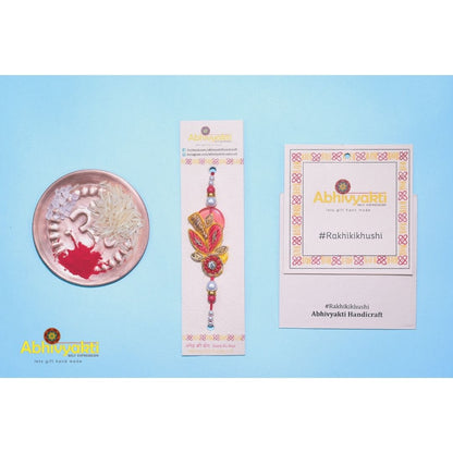 Green thread, zardozi thread and crystal rakhi 