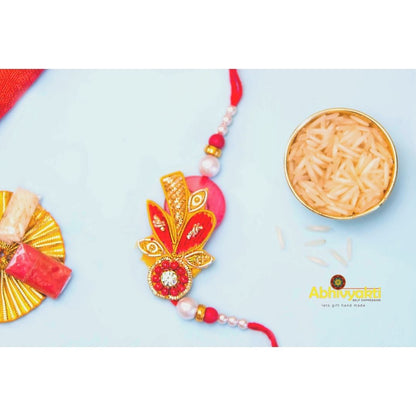 Green thread, zardozi thread and crystal rakhi 