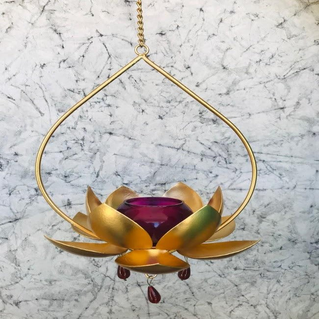 "Elegant wall-mounted Diwali diyas with intricate metal holders, designed to hang on the wall for a unique and stylish look. The diyas cast a soft, flickering light, creating a serene and festive ambiance for Diwali celebrations."