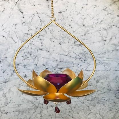 "Elegant wall-mounted Diwali diyas with intricate metal holders, designed to hang on the wall for a unique and stylish look. The diyas cast a soft, flickering light, creating a serene and festive ambiance for Diwali celebrations."